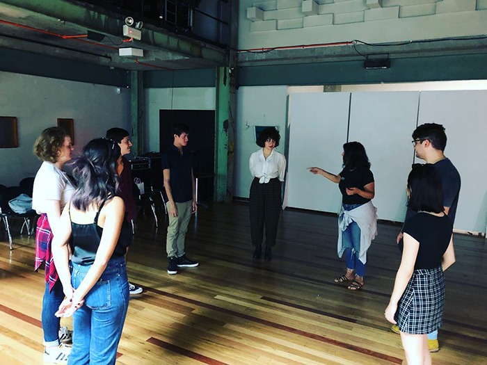 confident teenagers in an acting class learning drama and acting skills